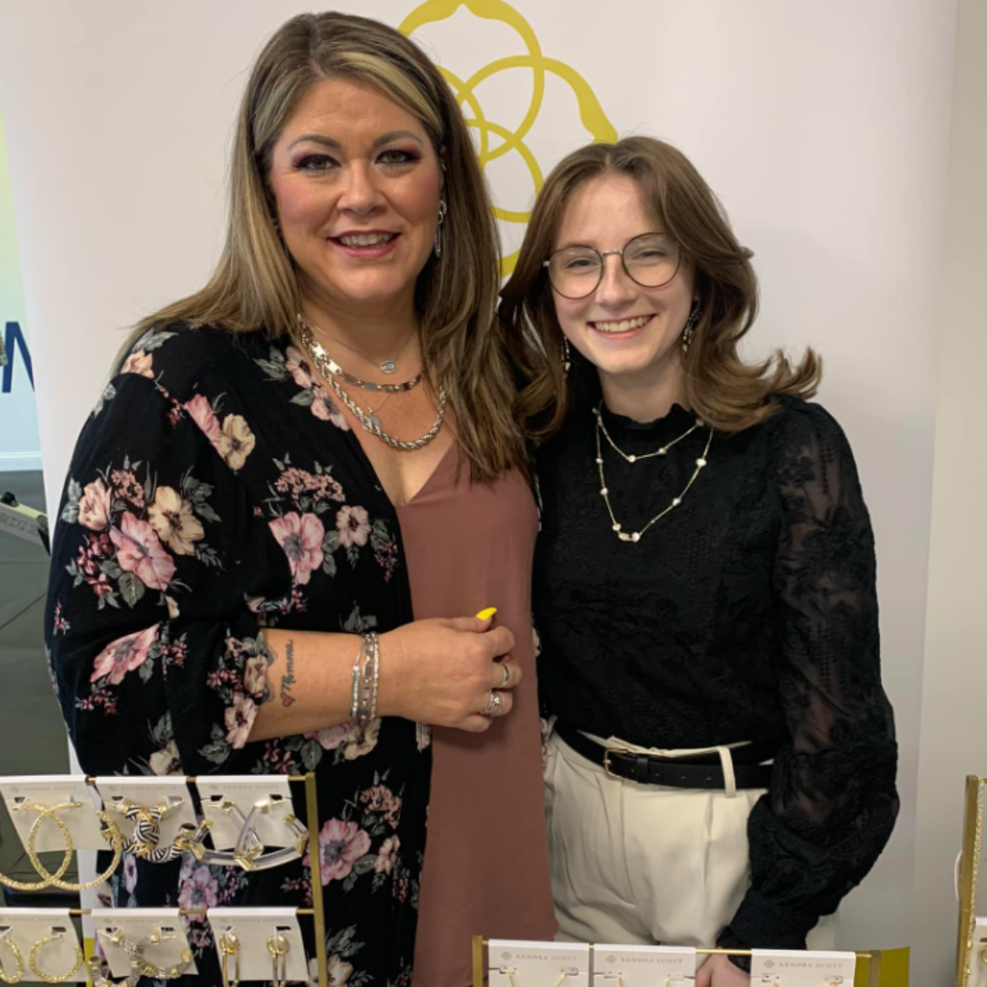 two ladies smiling